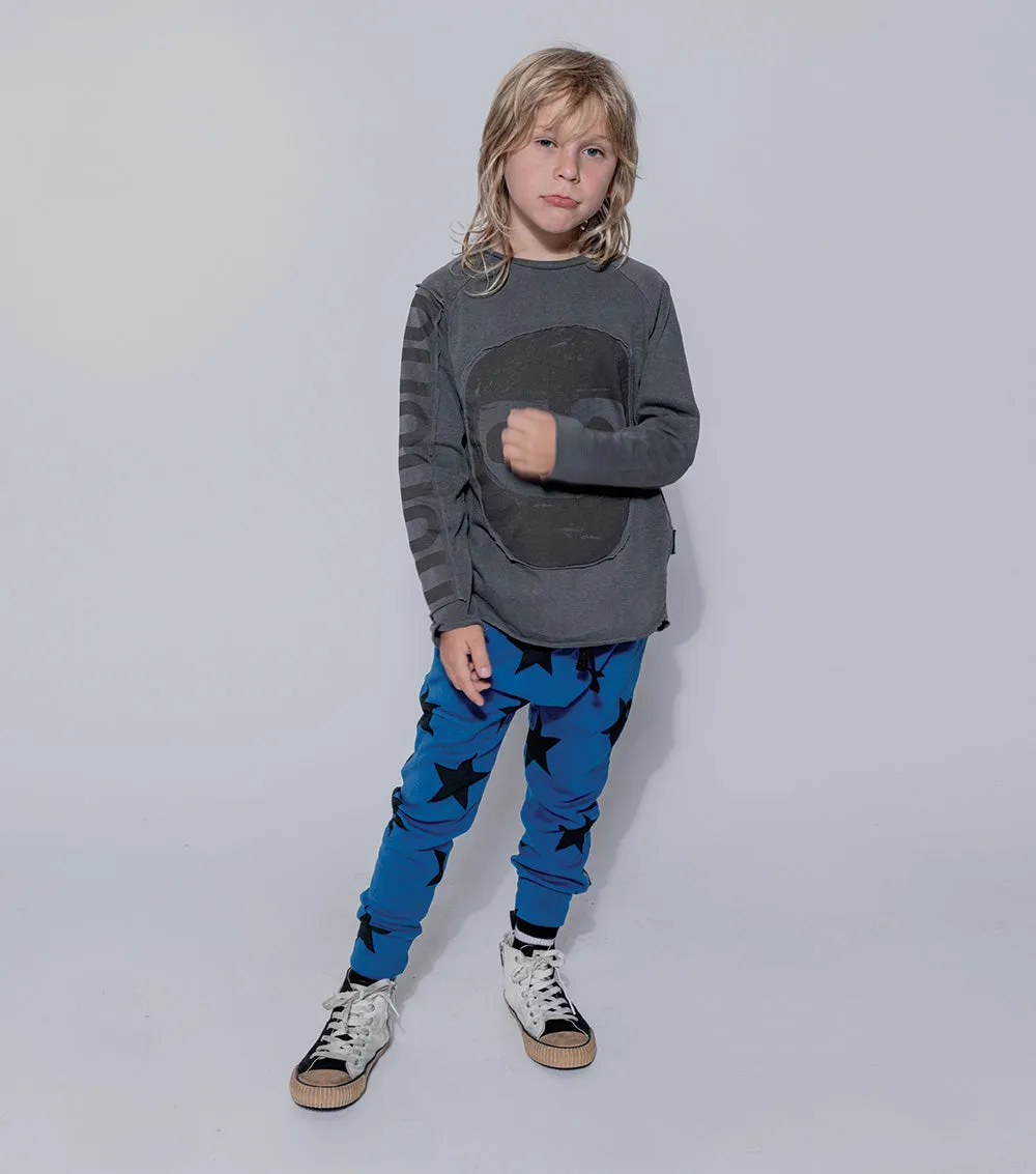 NUNUNU Light Star Baggy Pants Blue
